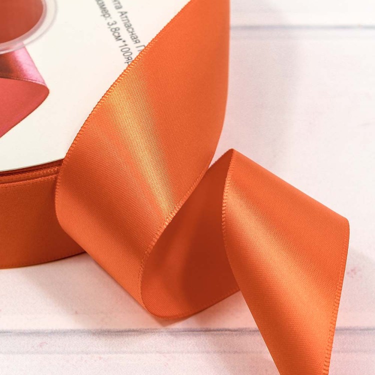 556-38/750 Лента атласная 1/9 (полиэстер) 3,8 см*100 ярдов красно-оранжевый 1/36