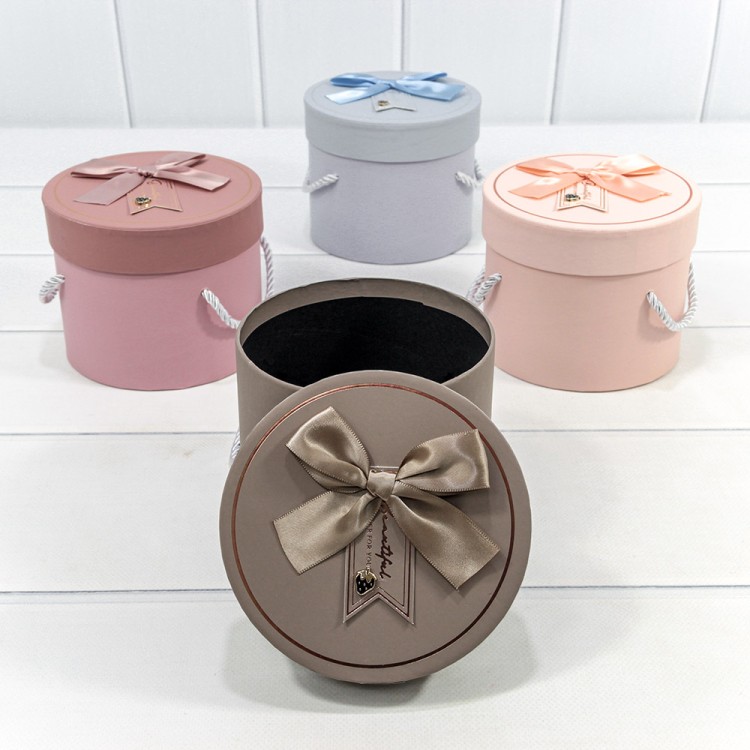 93103/2 Коробка Круглая 13,8*11,5 с ручками и бантиком (микс 2) 1/4 1/48